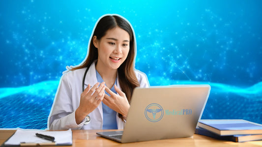 Clinic management software screen visible as a doctor works, with stethoscope and medical notes nearby.